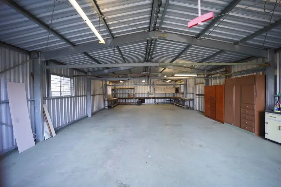 Bare concrete floor in a detached steel shop building near Bismarck ND